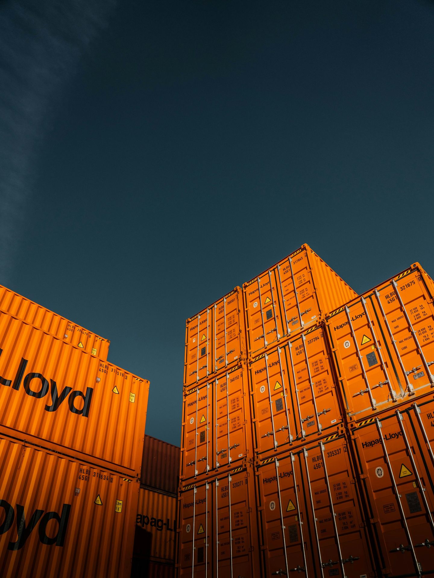 brown cardboard boxes under blue sky during daytime